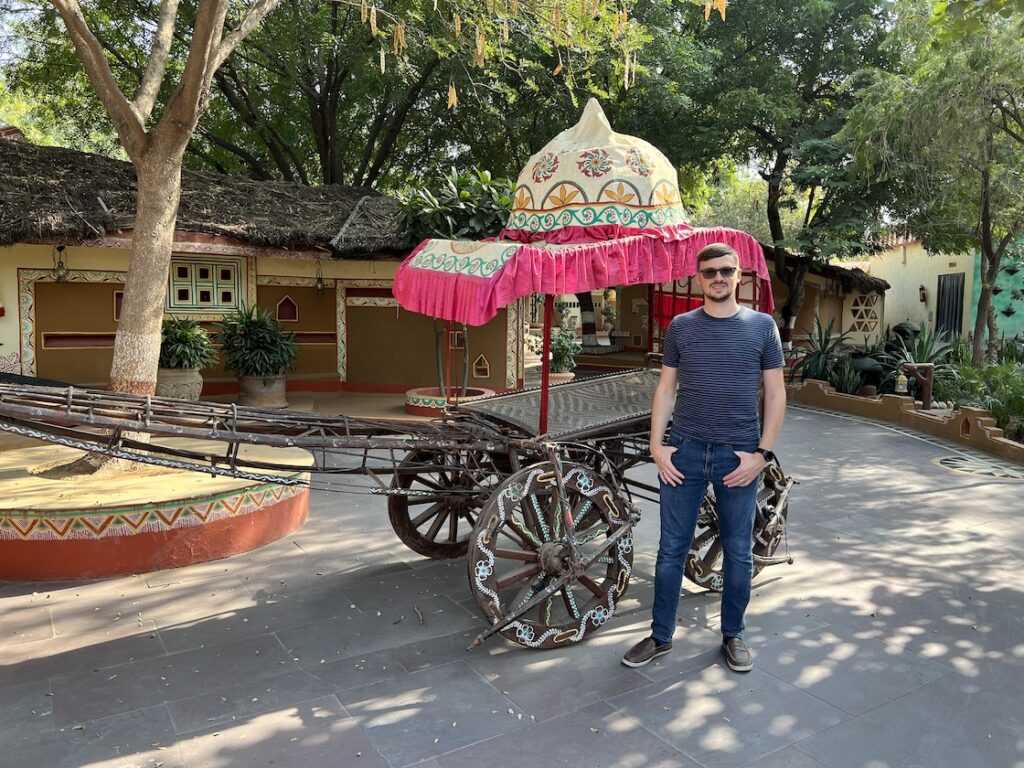A decorated bullock cart on display at Chokhi Dhani, Jaipur