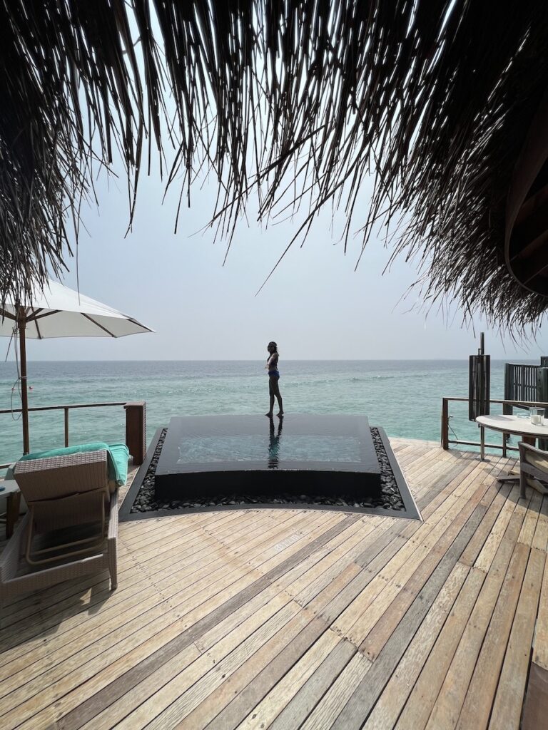 Fish eye view of plunge pool water villa