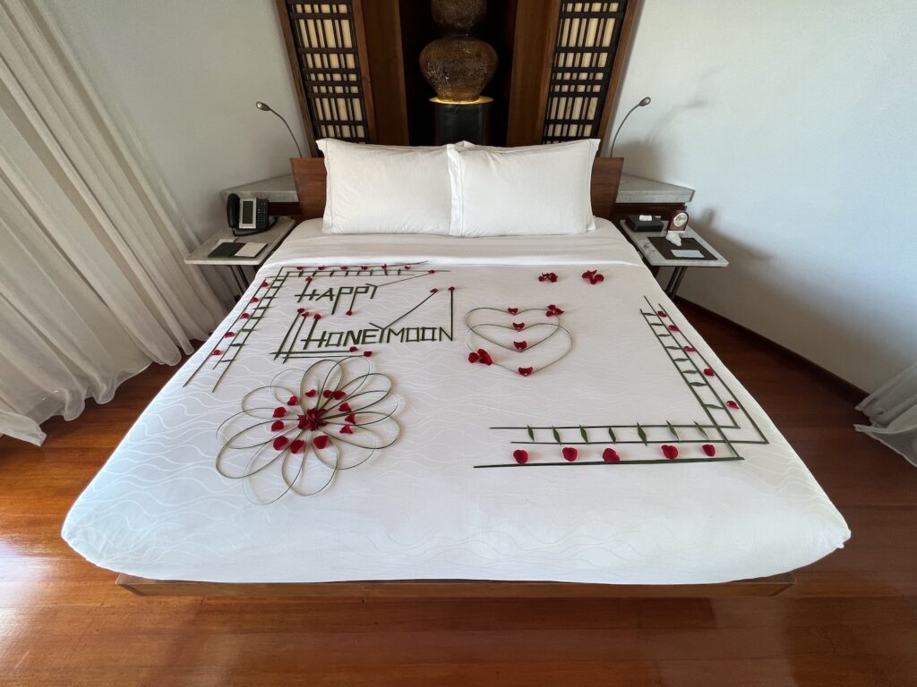 Bed decorated for our honeymoon, how to plan the perfect trip to the Maldives