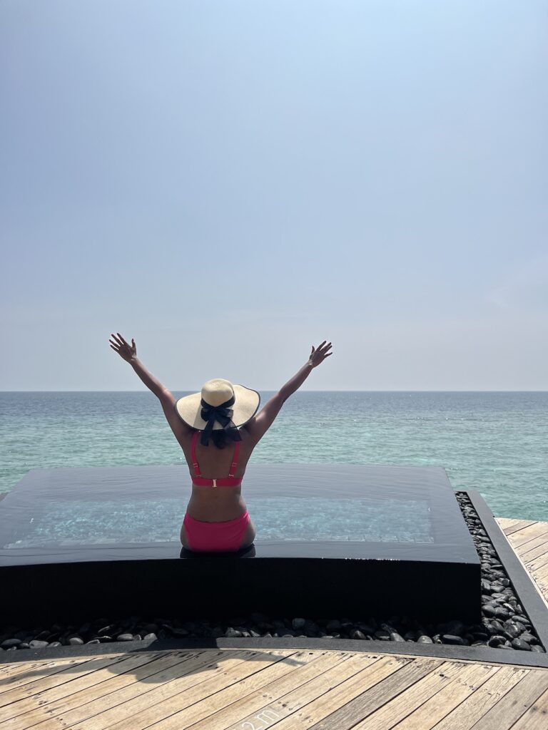 Sunhat with pink bikini, Maldives packing list