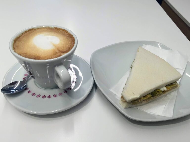 Coffee and small sandwich