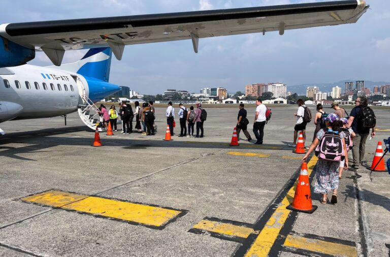 Passengers boarding a Tag flight